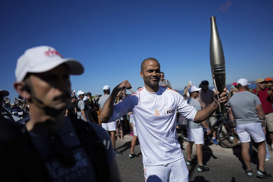 W.S. : "French Vintners Carry the 2024 Paris Olympic Torch"